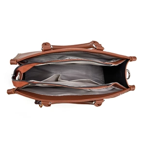 Interior view of brown leather handbag featuring three large compartments and gray lining