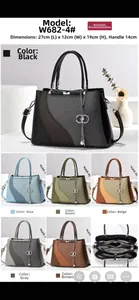 Detail der Mehrfachfächer und Abmessungen der farbblockierten Handtasche