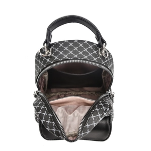 Detailed interior view of the checkered backpack showing multiple storage compartments