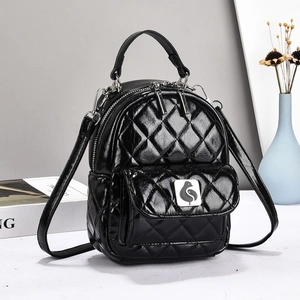 Glossy black quilted mini backpack for women with metal logo and adjustable straps