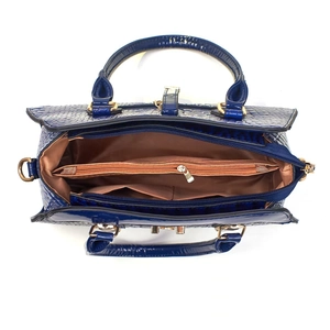 Internal view of the blue crocodile pattern handbag showing multiple storage compartments