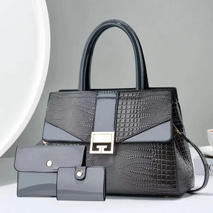 Detailed set of blue faux crocodile leather handbag, matching wallet, and a card holder