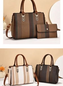 Detailed view of large color-block tote bag set with adjustable strap and gold hardware