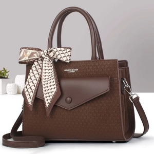 Brown faux leather handbag with woven texture, silk scarf bow and top handles