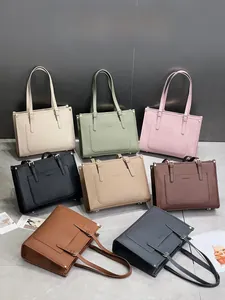 Detailed view of large tote bags in multiple colors with fashion text and dimensions