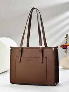 Minimalist brown tote bag in pebbled leather with top handles and front pocket