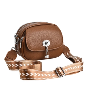 Brown litchi grain leather crossbody bag with dual zippers and woven jacquard strap