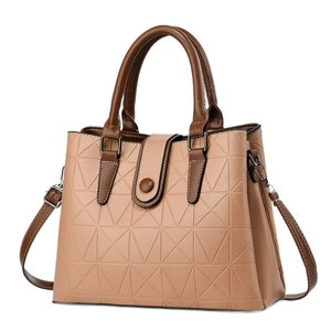 Chic beige textured faux leather tote bag with geometric patterns and brown handles