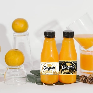 Graduation water bottle labels with Congrats GRAD text and doctor cap icons in black and gold
