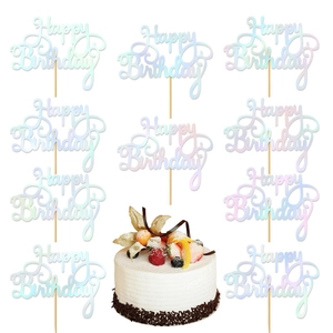 Set of 11 laser rainbow Happy Birthday cake toppers on a fresh strawberry cream cake