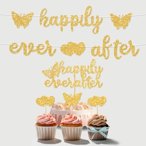 Golden glitter Happily Ever After banner with butterfly and heart cake topper decorations