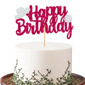 Pink glitter Happy Birthday cake topper with silver cowboy hat and golf ball decoration