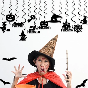 Halloween hanging swirl decorations featuring pumpkins, bats, and witches in a party setting