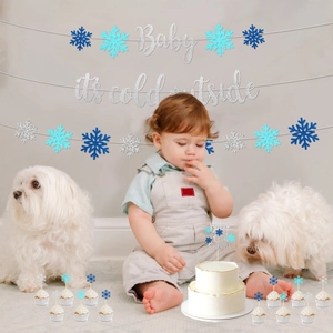 Winter snowflake party decoration set with Baby it's cold outside banner and cake toppers