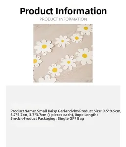 Detailed view of white daisy garland banners in three sizes for party decorations
