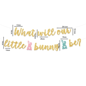 Gender reveal banner with bunny designs and gold glitter text measuring 10.5cm to 18.5cm