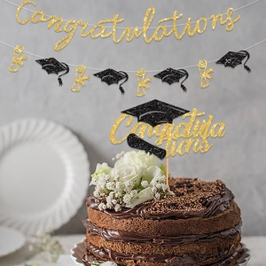 Glittering gold graduation party set with Congratulations banner and cake topper