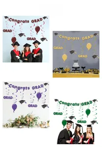 Detail of colorful Congrats GRAD banners and spiral hanging ornaments for graduation party decor
