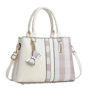 Three-layer color-block beige handbag with striped panel and gold bow charm detail