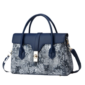 Elegant Chinese style embroidery handbag with navy blue leather and golden metal clasp
