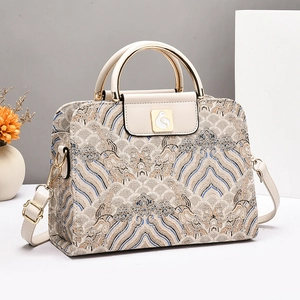 Sac à main élégant à motif oriental avec broderie de vagues et poignées dorées