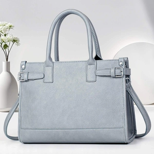 Elegant light blue lychee pattern leather tote bag with silver buckle for office commuting