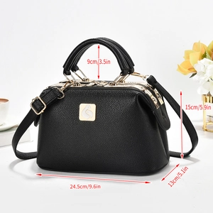 Black pebbled leather Boston bag with golden hardware and adjustable strap for women