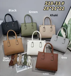 Variety of pebbled leather handbags in seven colors with silver hardware and shoulder straps
