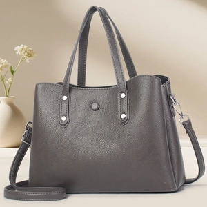 Classic dark grey litchi grain leather tote bag with silver rivets and dual handles