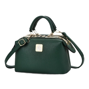 Dark green lychee leather Boston handbag with gold hardware and adjustable strap