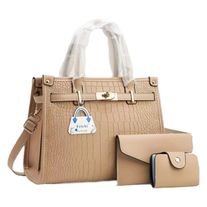 Three-piece beige crocodile pattern tote bag set with matching wallet and card holder