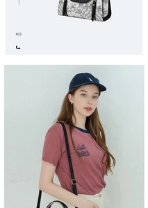Detail of red t-shirt with retro car print and black white patterned shoulder bag