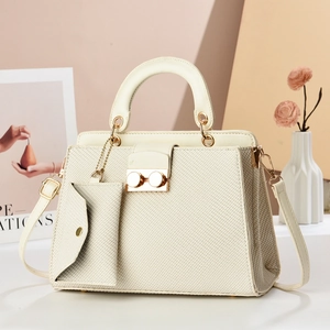 Elegant cream woven handbag with gold lock and matching mini pouch for women