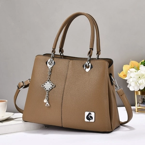Brown litchi grain handbag with pearl pendant and detachable shoulder strap for daily work