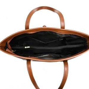 Internal view of tote bag showing multiple compartments and secure zipper pockets