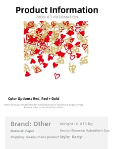Macro detail of red and glitter gold heart and LOVE paper confetti for party decor