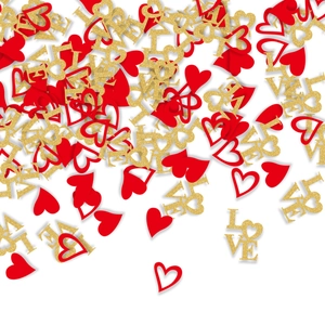 Detail of red heart confetti and gold glitter LOVE sequins for Valentine's Day decor