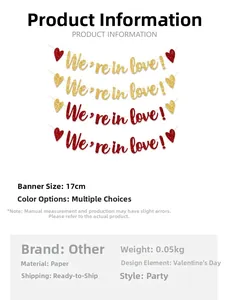 Detail view of Valentine heart garland with red and gold sequins on white background