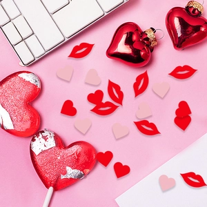 Valentine's Day heart and lip confetti set with heart props on pink background