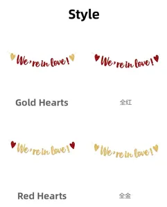 Glittery 'We're in love!' banner set in gold and red colors for wedding wall decoration