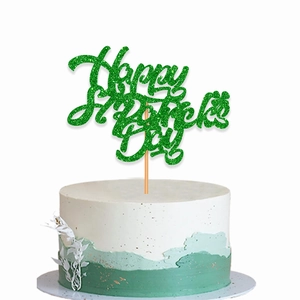 Close-up of Happy St. Patrick's Day green glitter cake topper with shamrock design