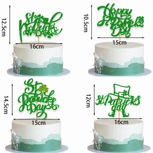 Green glitter St. Patrick's Day cake toppers with shamrock and hat designs