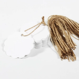 White scalloped round gift tags with pre-punched holes and natural jute twine set