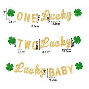 Glittery St. Patrick's Day banners with Lucky Baby clover designs for festive party decor