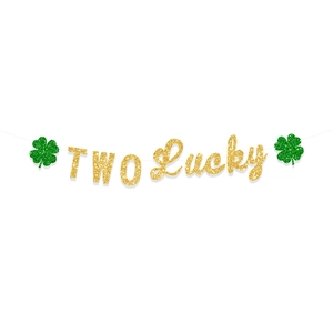 Close-up of TWO Lucky glitter banner with green shamrocks for St. Patrick’s Day party