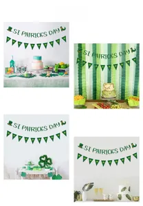 Close-up of St. Patrick's Day banner set with clover pennants and glittery letters
