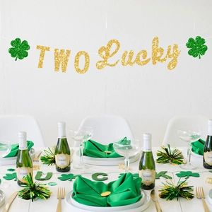 Two Lucky gold glitter banner with green shamrocks for Saint Patrick's Day party decor