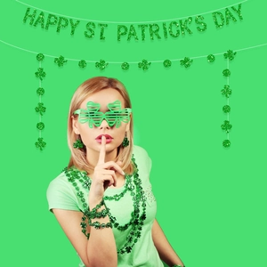 St. Patrick's Day glitter banner with shamrock glasses and necklace accessories set