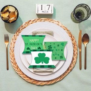 Three-piece St. Patrick's Day kraft paper pillow candy boxes with green clover designs