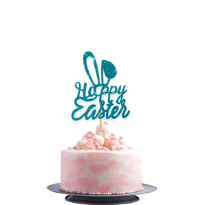 Blue glitter Happy Easter cake topper with bunny ears on a decorated birthday cake